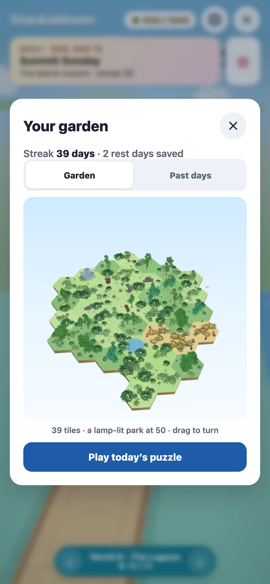A hexagon island garden of trees, paths and a pond, with a 39-day streak and two rest days saved